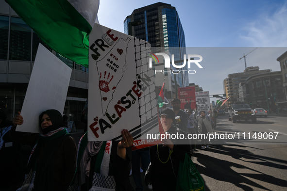 EDMONTON, CANADA - APRIL 14:
Members of the Palestinian diaspora supported by local activists, during the 'Stop Genocide Now' rally, marchin...