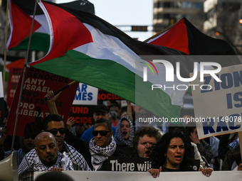 EDMONTON, CANADA - APRIL 14:
Members of the Palestinian diaspora supported by local activists, during the 'Stop Genocide Now' rally, marchin...