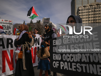 EDMONTON, CANADA - APRIL 14:
Members of the Palestinian diaspora supported by local activists, during the 'Stop Genocide Now' rally, marchin...