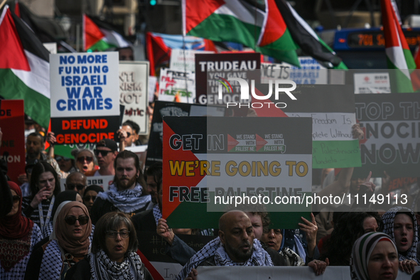 EDMONTON, CANADA - APRIL 14:
Members of the Palestinian diaspora supported by local activists, during the 'Stop Genocide Now' rally, marchin...