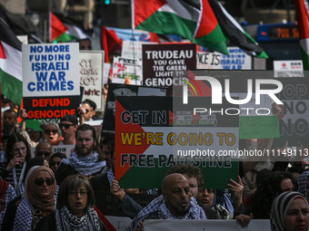 EDMONTON, CANADA - APRIL 14:
Members of the Palestinian diaspora supported by local activists, during the 'Stop Genocide Now' rally, marchin...