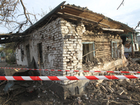 A private house is being damaged by the fall of Russian missile fragments in Dnipro, Ukraine, on April 15, 2024. (