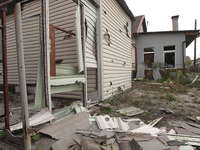 A private house is being damaged by the fall of Russian missile fragments in Dnipro, Ukraine, on April 15, 2024. (