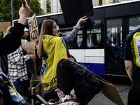 Passengers on public transport are passing by the action ''Don't be silent. Captivity Kills'' in support of the captured Azovstal defenders,...