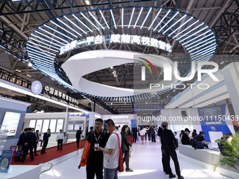 Citizens are visiting the exhibition area of the 61st China Higher Education Expo in Fuzhou, Fujian Province, China, on April 15, 2024. (