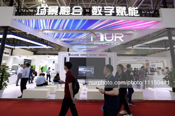 Citizens are visiting the exhibition area of the 61st China Higher Education Expo in Fuzhou, Fujian Province, China, on April 15, 2024. 