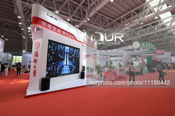 Citizens are visiting the exhibition area of the 61st China Higher Education Expo in Fuzhou, Fujian Province, China, on April 15, 2024. 