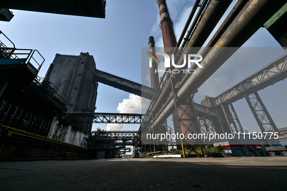 People are working on the premises of PJSC Zaporizhcoke in Zaporizhzhia, southeastern Ukraine, on April 11, 2024. 