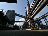 People are working on the premises of PJSC Zaporizhcoke in Zaporizhzhia, southeastern Ukraine, on April 11, 2024. (