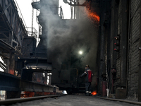 A worker is seen on the premises of PJSC Zaporizhcoke in Zaporizhzhia, Ukraine, on April 11, 2024. NO USE RUSSIA. NO USE BELARUS. (