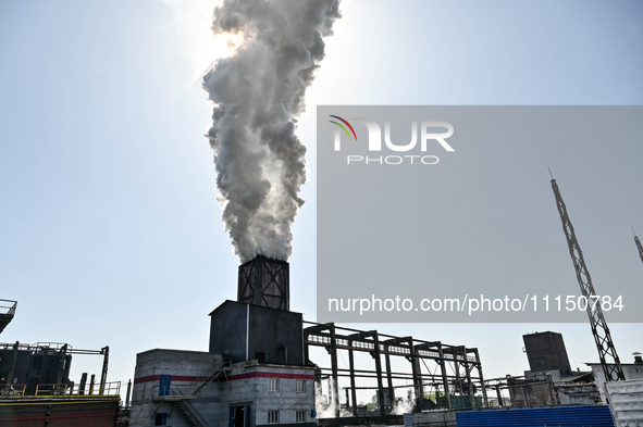 People are working on the premises of PJSC Zaporizhcoke in Zaporizhzhia, southeastern Ukraine, on April 11, 2024. 