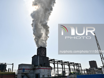 People are working on the premises of PJSC Zaporizhcoke in Zaporizhzhia, southeastern Ukraine, on April 11, 2024. (