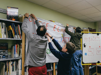 Several dozen parents, children, and staff are occupying the public school for the night at the College d'Echange contre le choc des savoirs...