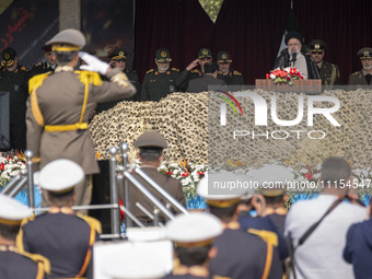 Iranian President Ebrahim Raisi (3rd R) is attending a military parade to mark Iran's Army Day anniversary at an Army military base in Tehra...