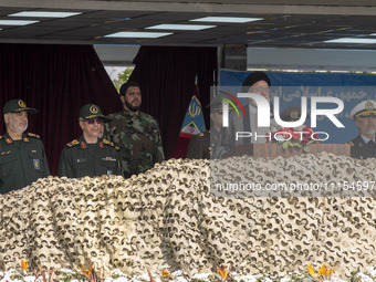 Iranian President Ebrahim Raisi (2nd R) is addressing attendees at a military parade marking Iran's Army Day anniversary at an Army military...