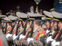 Iranian President Ebrahim Raisi (C) is attending a military parade to mark Iran's Army Day anniversary at an Army military base in Tehran, I...