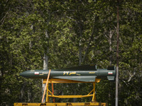 A truck is carrying an Iranian-made Asr-67 missile during a military parade marking Iran's Army Day anniversary at an Army military base in...