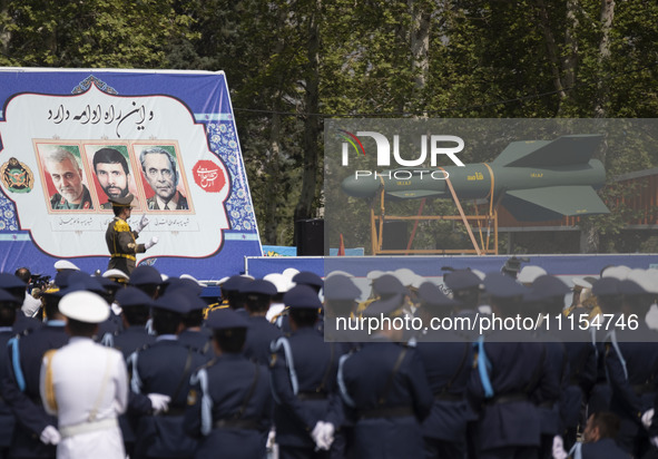 A truck is carrying an Iranian-made Qased bomb during a military parade marking Iran's Army Day anniversary at an Army military base in Tehr...