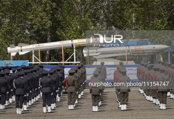 A truck is carrying Iranian-made Sayyad-4B missiles during a military parade marking the anniversary of Iran's Army Day at an Army military...