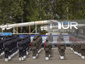 A truck is carrying Iranian-made Sayyad-4B missiles during a military parade marking the anniversary of Iran's Army Day at an Army military...