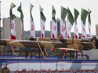 A truck is carrying an Iranian-made Unmanned Aerial Vehicle (UAV) during a military parade marking Iran's Army Day anniversary at an Army mi...