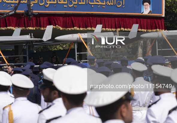 A truck is carrying Iranian-made Unmanned Aerial Vehicles (UAVs) during a military parade marking the anniversary of Iran's Army Day at an A...