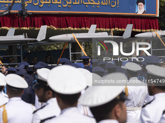 A truck is carrying Iranian-made Unmanned Aerial Vehicles (UAVs) during a military parade marking the anniversary of Iran's Army Day at an A...