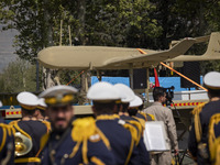 A truck is carrying an Iranian-made Unmanned Aerial Vehicle (UAV) during a military parade marking Iran's Army Day anniversary at an Army mi...