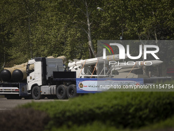 A truck is carrying Iranian-made Sayyad-4B missiles during a military parade marking the anniversary of Iran's Army Day at an Army military...