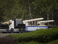 A truck is carrying Iranian-made Sayyad-4B missiles during a military parade marking the anniversary of Iran's Army Day at an Army military...