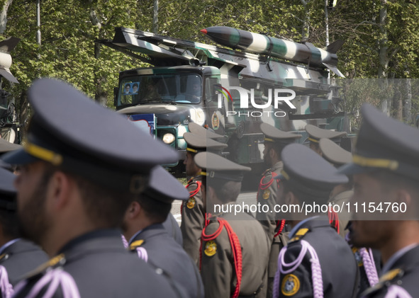 A truck is carrying an Iranian-made missile during a military parade marking Iran's Army Day anniversary at an Army military base in Tehran,...