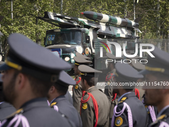 A truck is carrying an Iranian-made missile during a military parade marking Iran's Army Day anniversary at an Army military base in Tehran,...