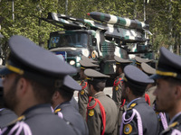 A truck is carrying an Iranian-made missile during a military parade marking Iran's Army Day anniversary at an Army military base in Tehran,...