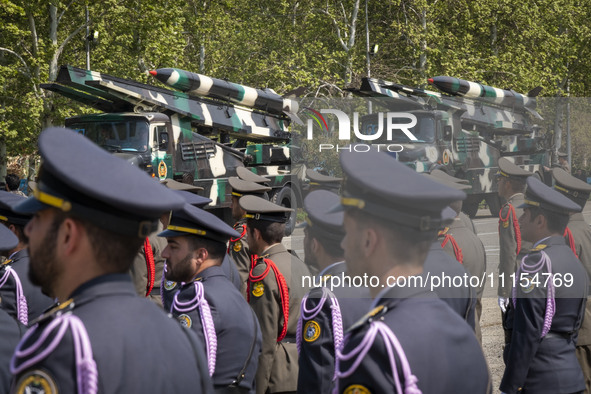 A truck is carrying Iranian-made missiles during a military parade marking the anniversary of Iran's Army Day at an Army military base in Te...