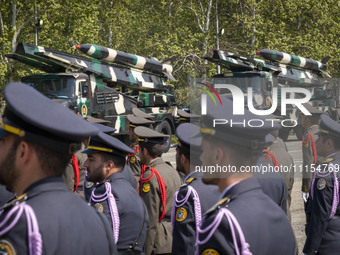 A truck is carrying Iranian-made missiles during a military parade marking the anniversary of Iran's Army Day at an Army military base in Te...