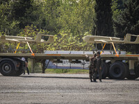 A truck is carrying Iranian-made Unmanned Aerial Vehicles (UAVs) during a military parade marking the anniversary of Iran's Army Day at an A...