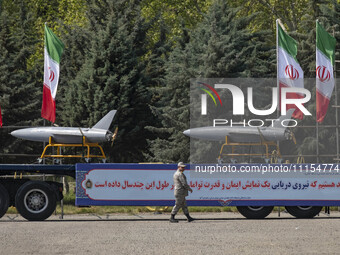 A truck is carrying Iranian-made Unmanned Aerial Vehicles (UAVs) during a military parade marking the anniversary of Iran's Army Day at an A...