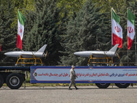 A truck is carrying Iranian-made Unmanned Aerial Vehicles (UAVs) during a military parade marking the anniversary of Iran's Army Day at an A...