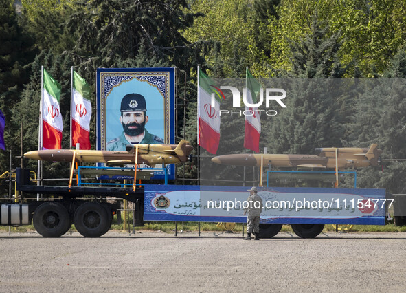 A truck is carrying Iranian-made Unmanned Aerial Vehicles (UAVs) during a military parade marking the anniversary of Iran's Army Day at an A...