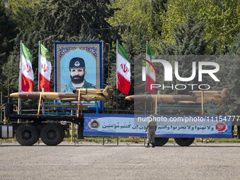 A truck is carrying Iranian-made Unmanned Aerial Vehicles (UAVs) during a military parade marking the anniversary of Iran's Army Day at an A...