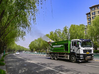 A fog cannon truck is carrying out spraying operations on Jiangjunshan Road in Qingzhou, China, on April 17, 2024. Every April and May is th...