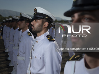 Members of the Iranian navy are standing at attention during a military parade marking the anniversary of Iran's Army Day at an Army militar...