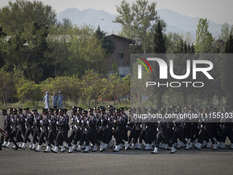 Members of the Iranian navy are preparing to march in a military parade marking the anniversary of Iran's Army Day at an Army military base...