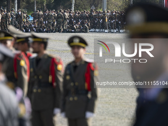 Members of the Iranian Army's land force are preparing to march in a military parade marking Iran's Army Day anniversary at an Army military...