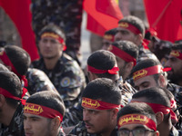 Members of the Basij paramilitary force are preparing to march in a military parade marking the anniversary of Iran's Army Day at an Army mi...