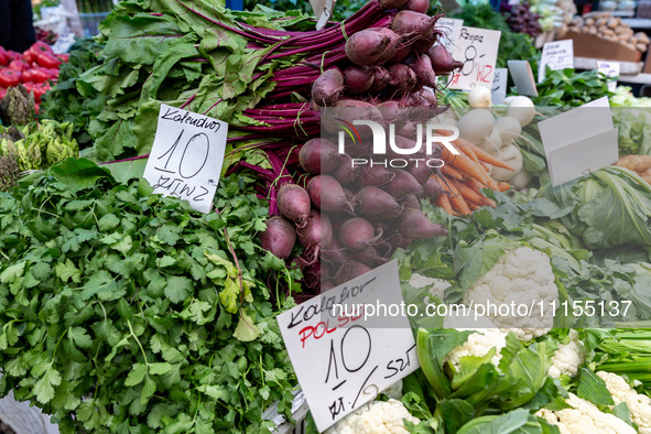 Early vegetables are seen on market stands on Old Kleparz Market in Old Town of Krakow as spring gardening season started in Poland on April...