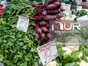 Early vegetables are seen on market stands on Old Kleparz Market in Old Town of Krakow as spring gardening season started in Poland on April...