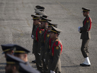 Members of the Iranian Army's honor guard are standing at attention during a military parade marking the anniversary of Iran's Army Day at a...