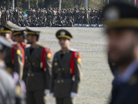 Members of the Iranian Army's land force are preparing to march in a military parade marking Iran's Army Day anniversary at an Army military...