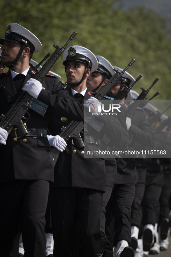 Members of the Iranian navy are marching in a military parade to mark the anniversary of Iran's Army Day at an Army military base in Tehran,...